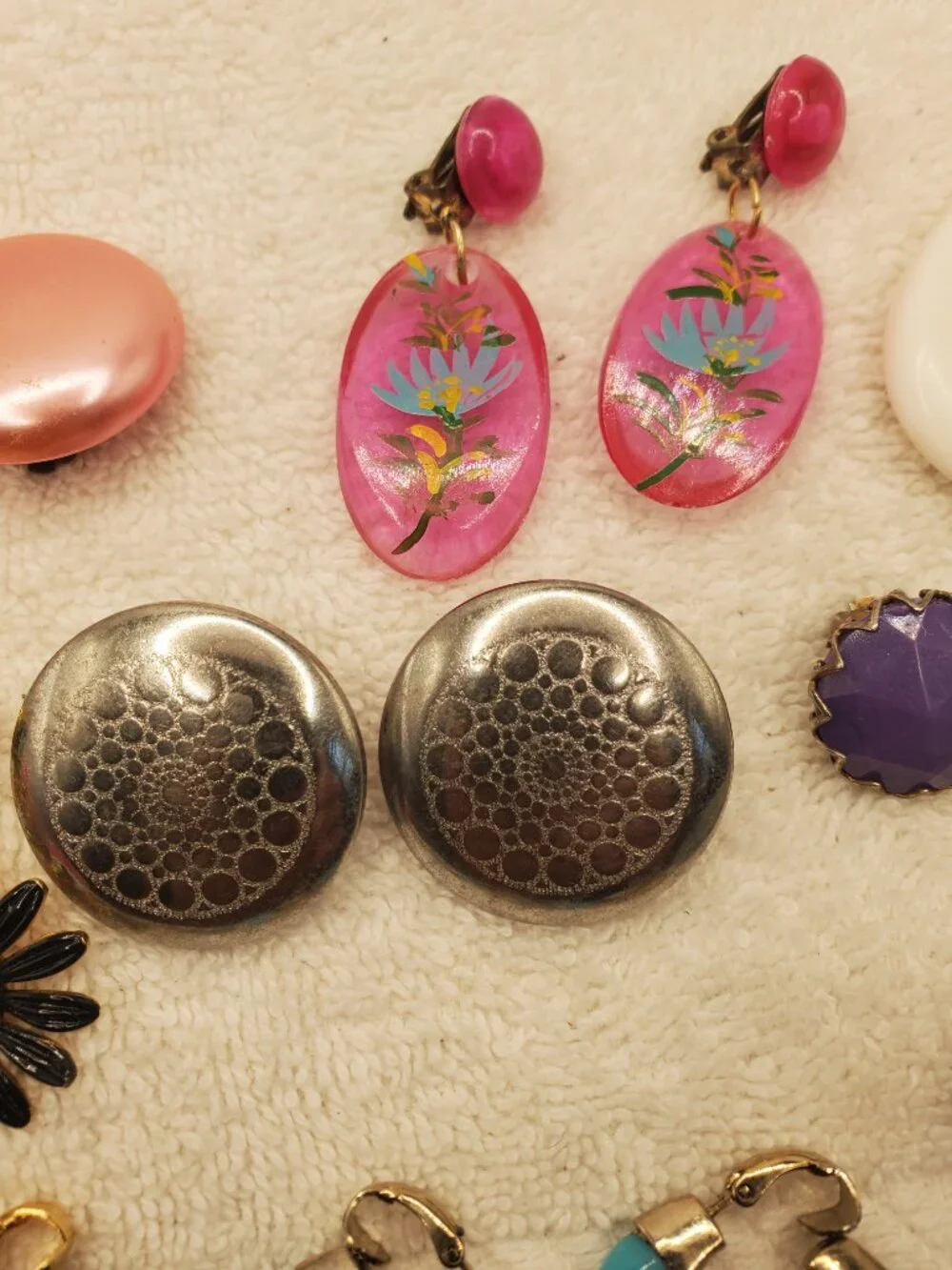 12 Pair of clip on earrings, items # B-2106-2117,.  wt. 123 grams.